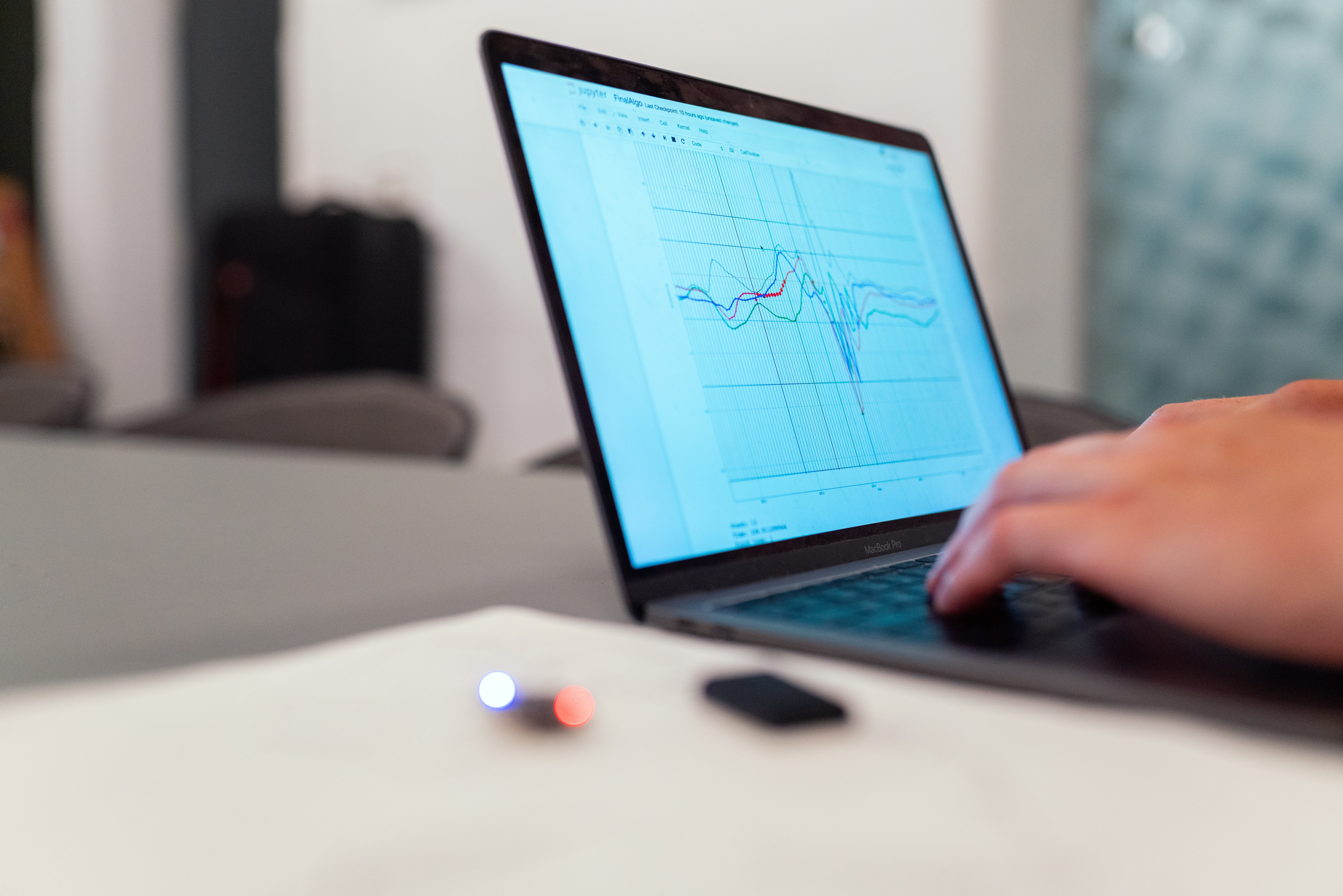 Close up of a laptop showing a graph