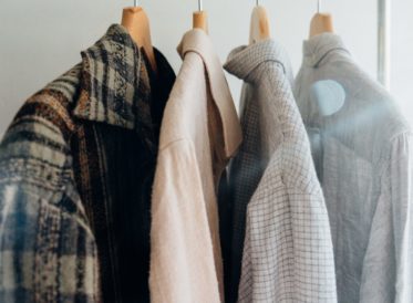 Shirts hanging up on a rail