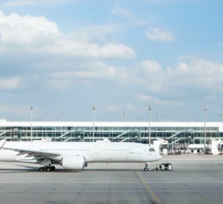 Commercial airplane outside an airport