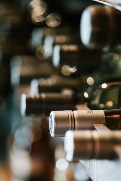 Stack of wine bottles on a shelf
