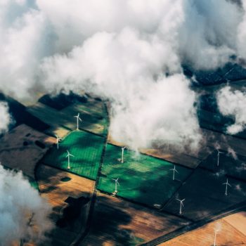 Green energy - wind turbines and clouds